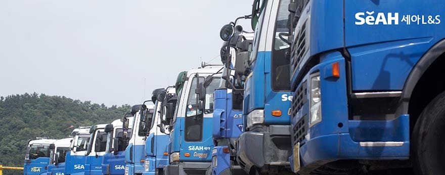 Several trucks are lined up.