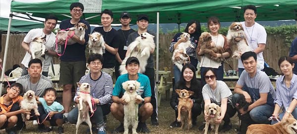 A group image along with a dog.